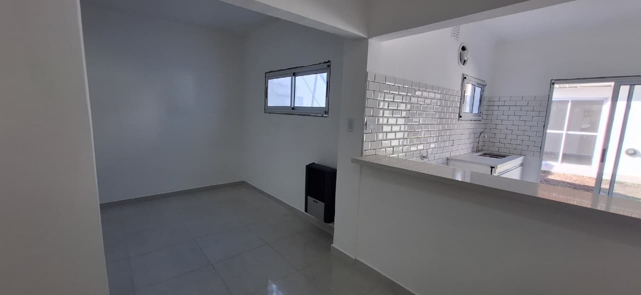 venta casa tres ambientes con garage y quincho zona Parque Luro