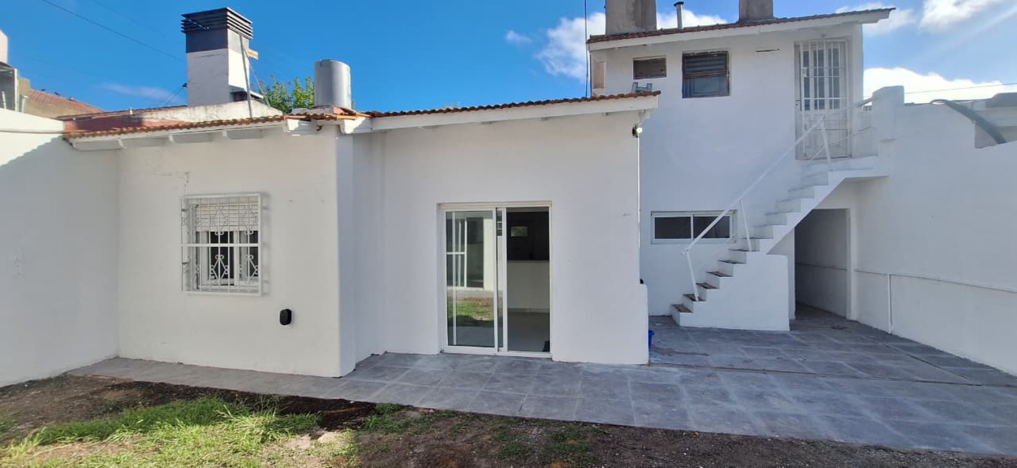 venta casa tres ambientes con garage y quincho zona Parque Luro